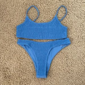 Blue swimsuit size M, NEVER WORN, JUST GOT IT